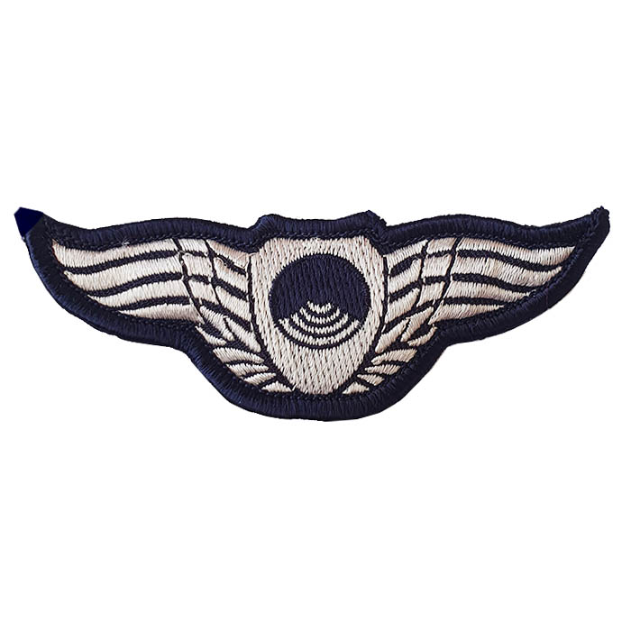Airborne flight controller fabric wing pin in Squadron 192 of the Israeli Air Force